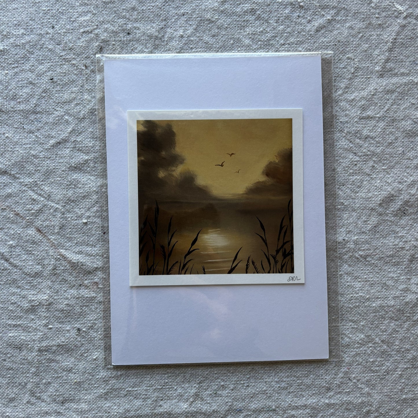 Small print of a sunset scene with birds on a textured gray surface