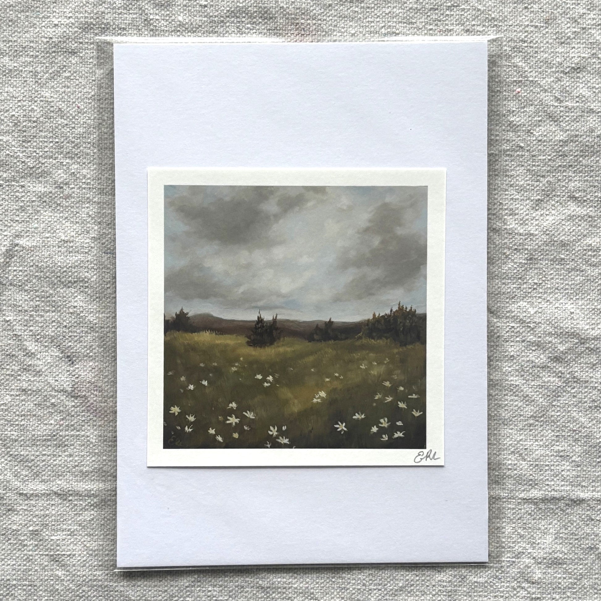 Art print of a landscape with trees and flowers on a textured gray background