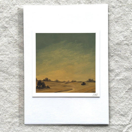 print of a landscape with fields and trees on a textured gray background
