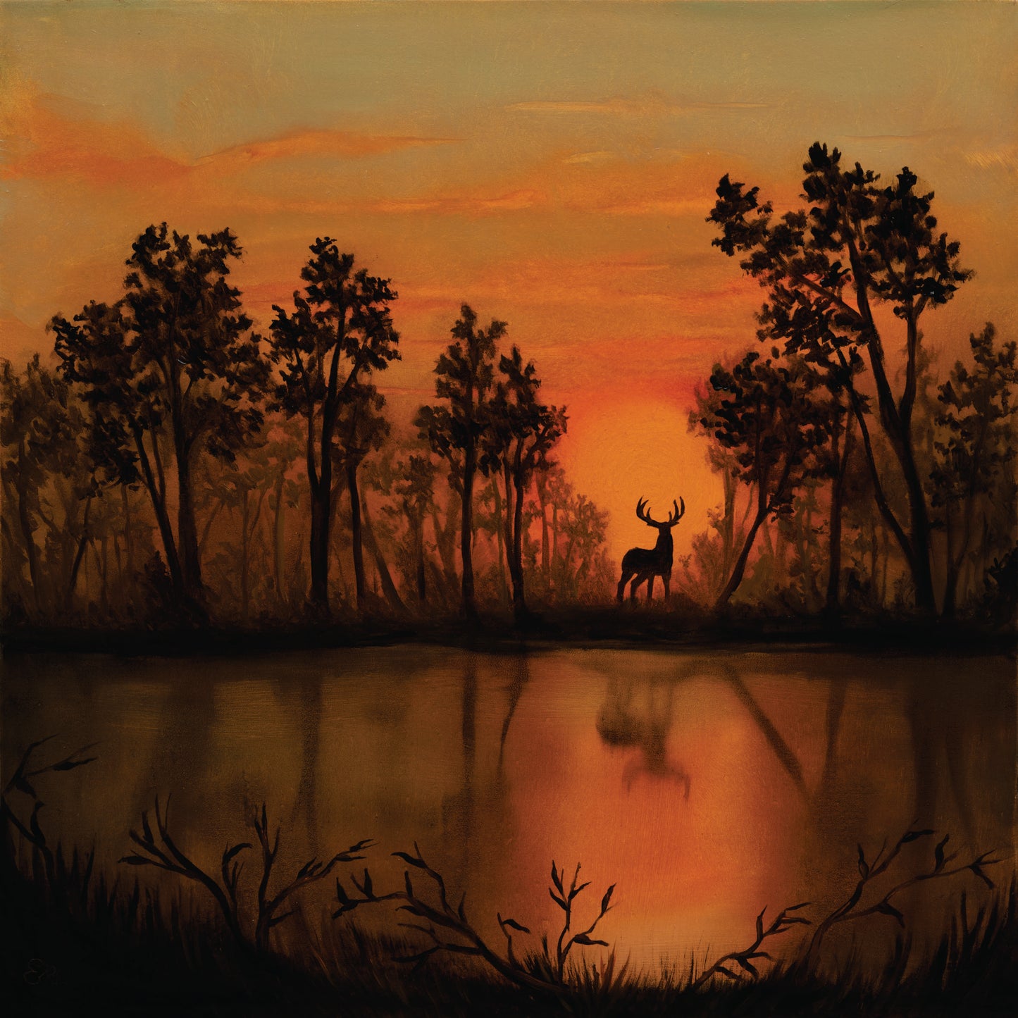 Silhouette of a deer by a lake at sunset with orange and red sky.